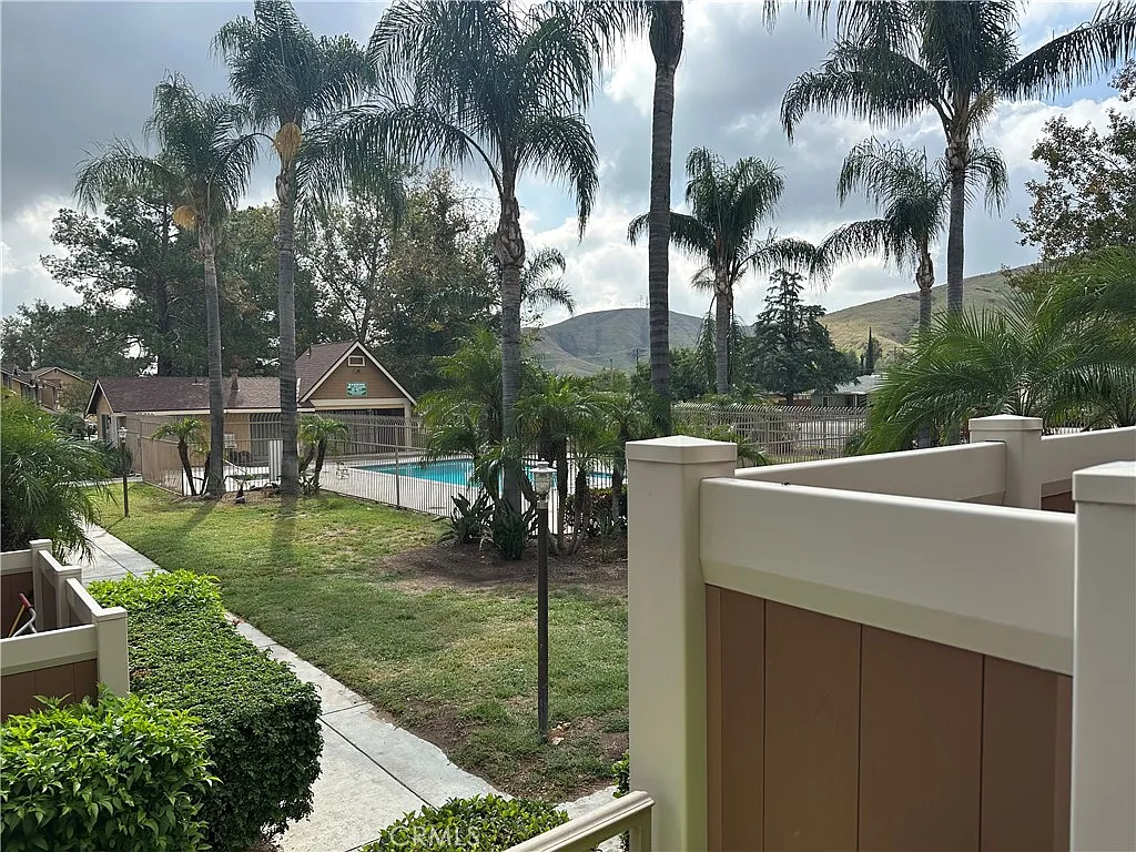 A view of a pool with a lot of trees in California