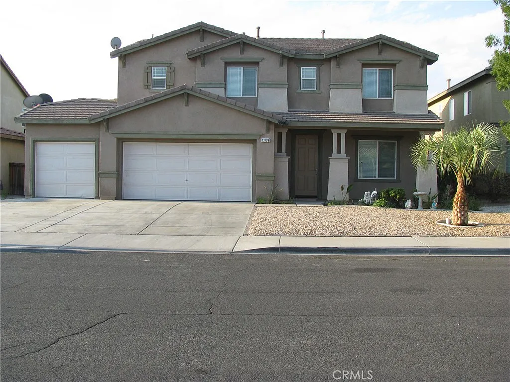A house with two garage doors in California